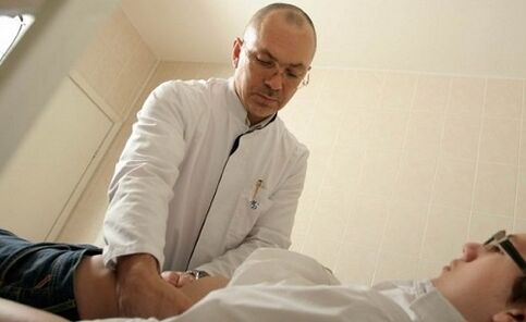 Doctor examines patient with prostatitis